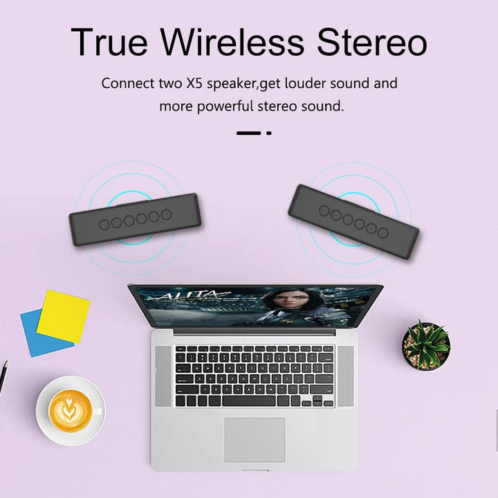 "Portable black waterproof 30W Bluetooth speaker with 4000mAh battery, dual drivers, compact for outdoor use."