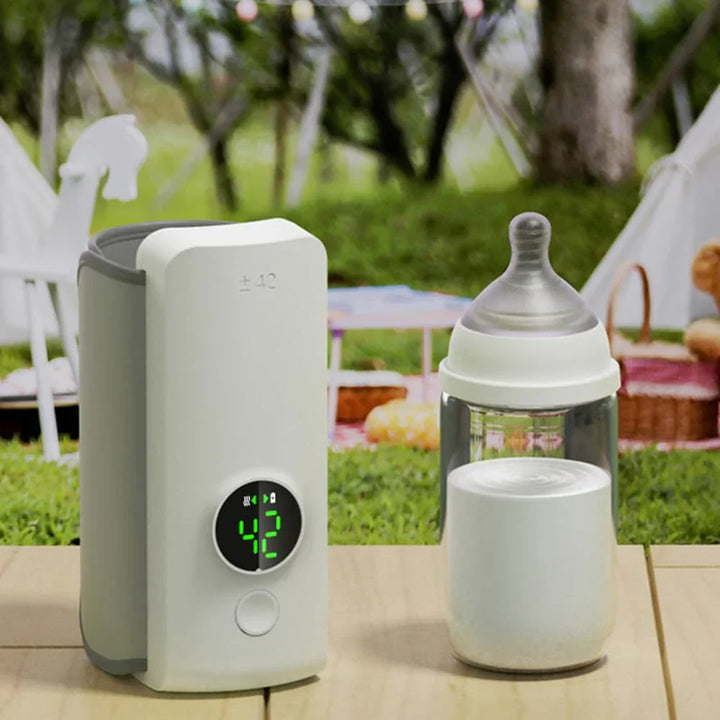"Portable rechargeable baby bottle warmer with digital display, compact design, BPA-free, USB charging, perfect temperature."