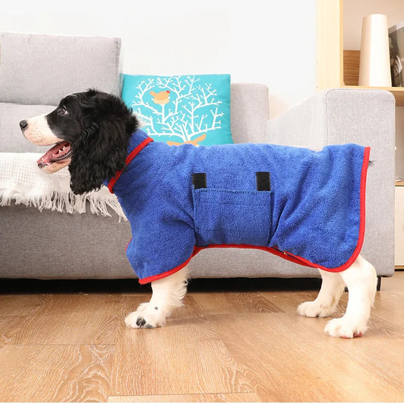 "Quick-drying dog bathrobe in soft blue microfiber, snug fit with Velcro closures, ideal for cozy warmth after baths."