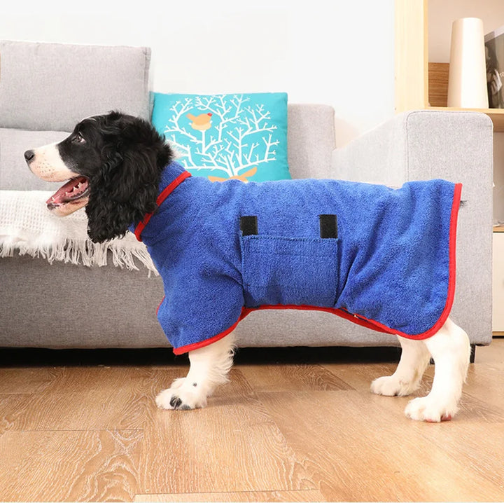 "Quick-drying dog bathrobe in soft blue microfiber, snug fit with Velcro closures, ideal for cozy warmth after baths."
