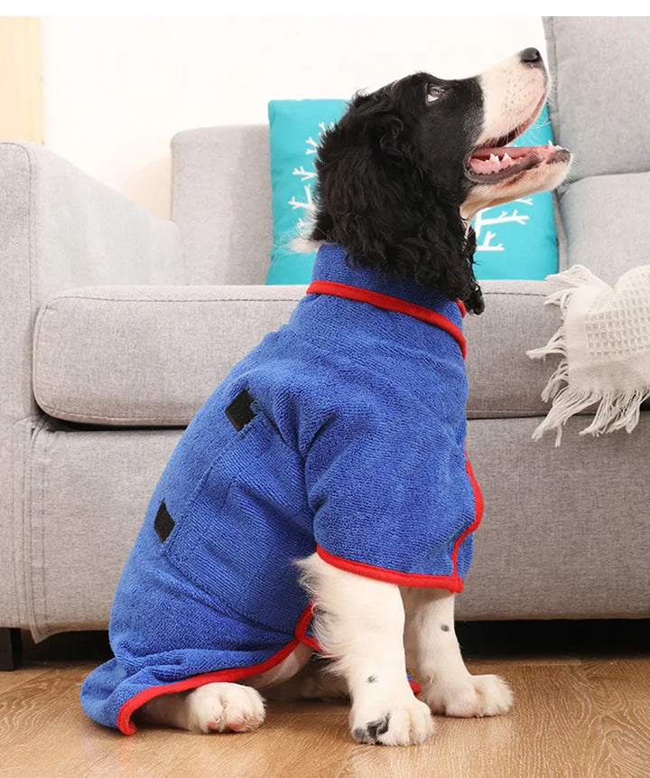 "Quick-drying dog bathrobe in soft blue microfiber, snug fit with Velcro closures, ideal for cozy warmth after baths."