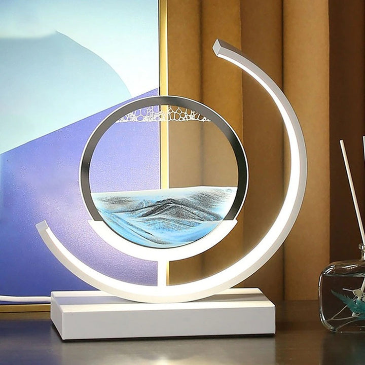 Quicksand art table lamp with rotating sand patterns, 360-degree rotation, elegant design, soft LED light, stress relief.