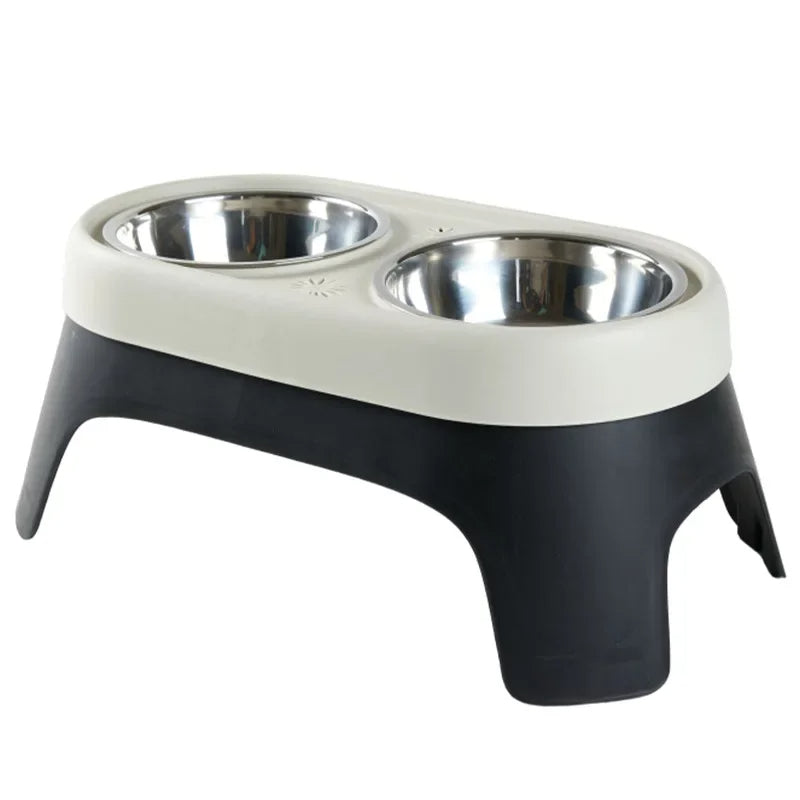 "Raised dog feeding station with sleek stainless steel bowls on a stable, non-slip base for mess-free, stylish dining."