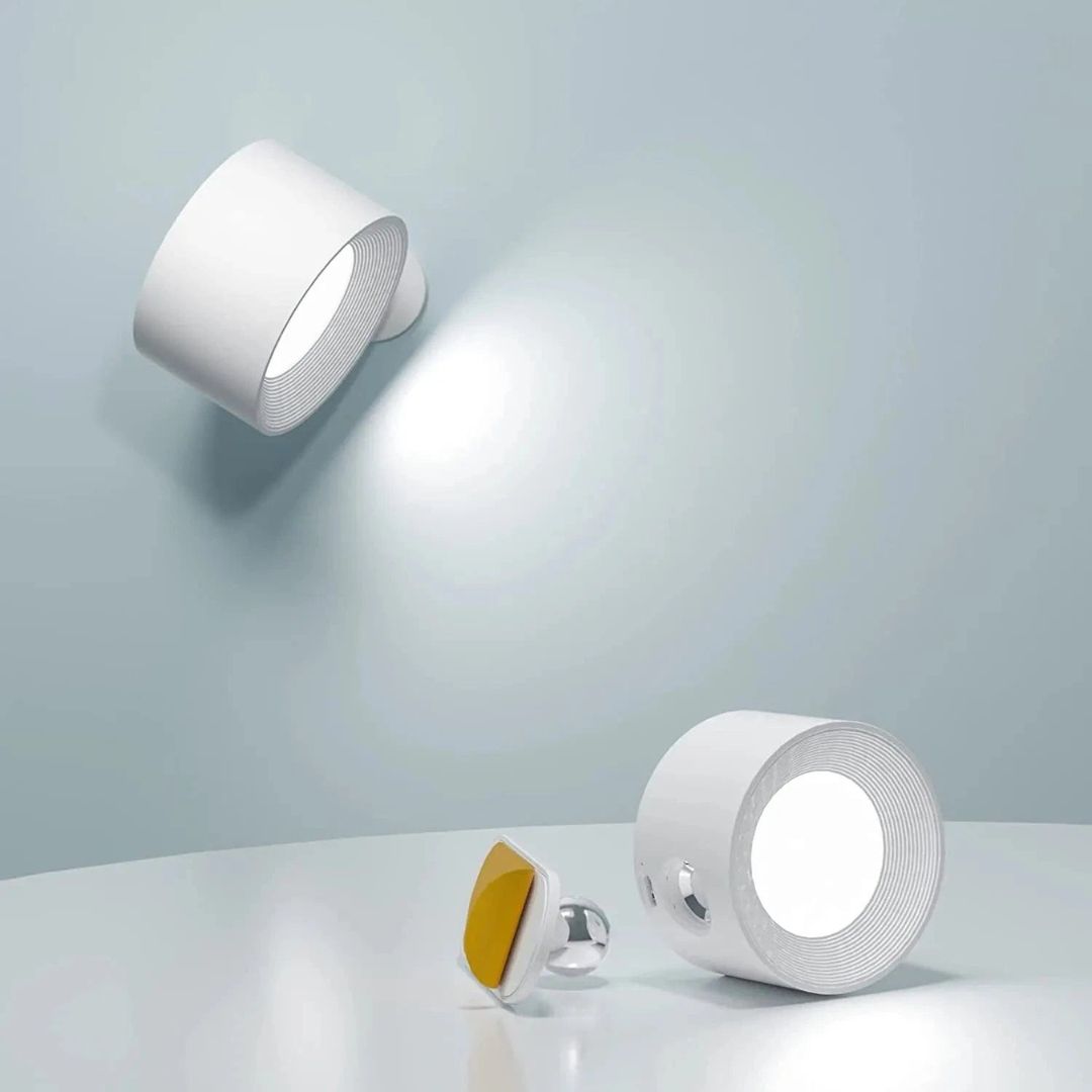 "Rechargeable 360° rotating wall light, features sleek design with magnetic ball joint, touch control, and adjustable lightin