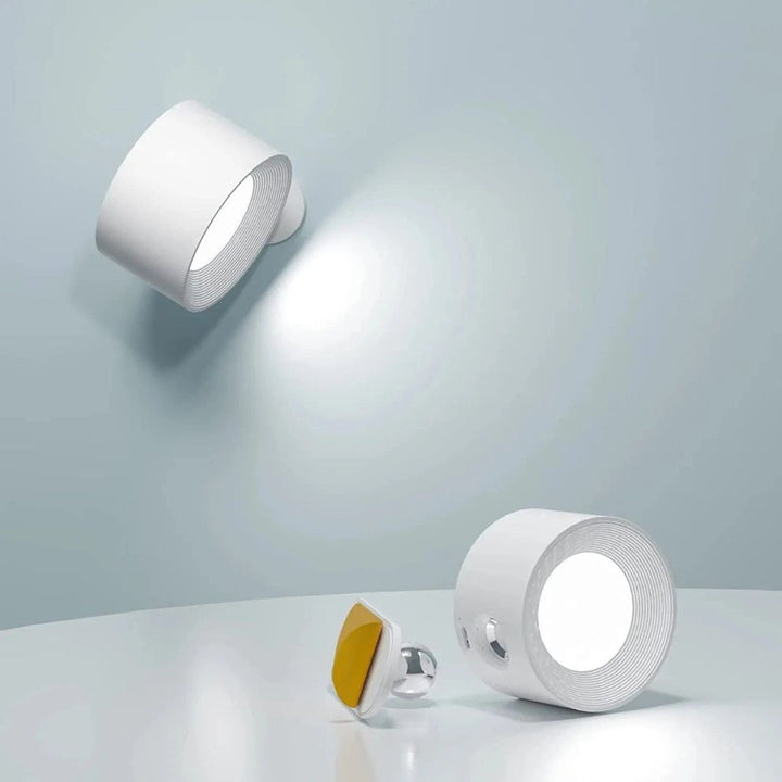 "Rechargeable 360° rotating wall light, features sleek design with magnetic ball joint, touch control, and adjustable lightin