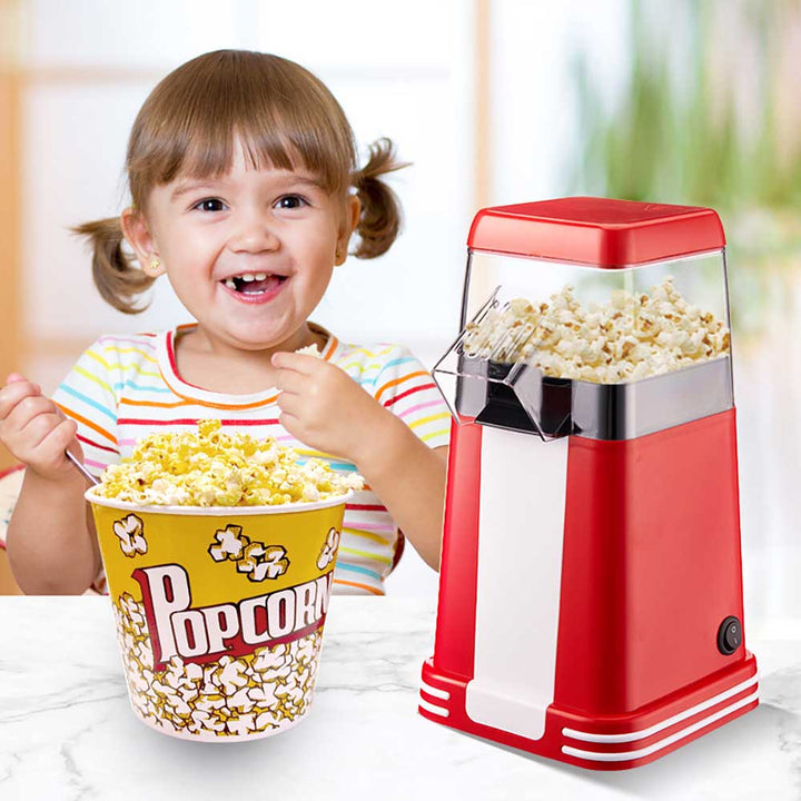 Red and white retro 1200W hot air popcorn maker with vintage design; ideal for healthy, quick snacks at home or parties.