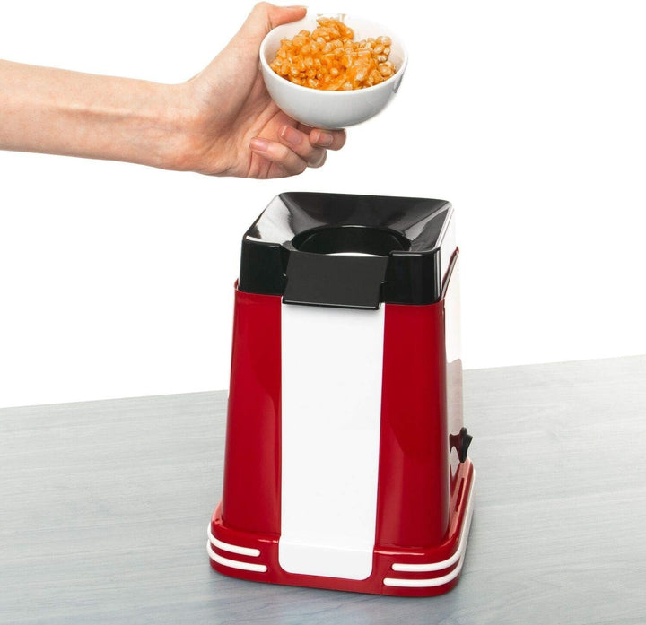 Red and white retro 1200W hot air popcorn maker with vintage design; ideal for healthy, quick snacks at home or parties.