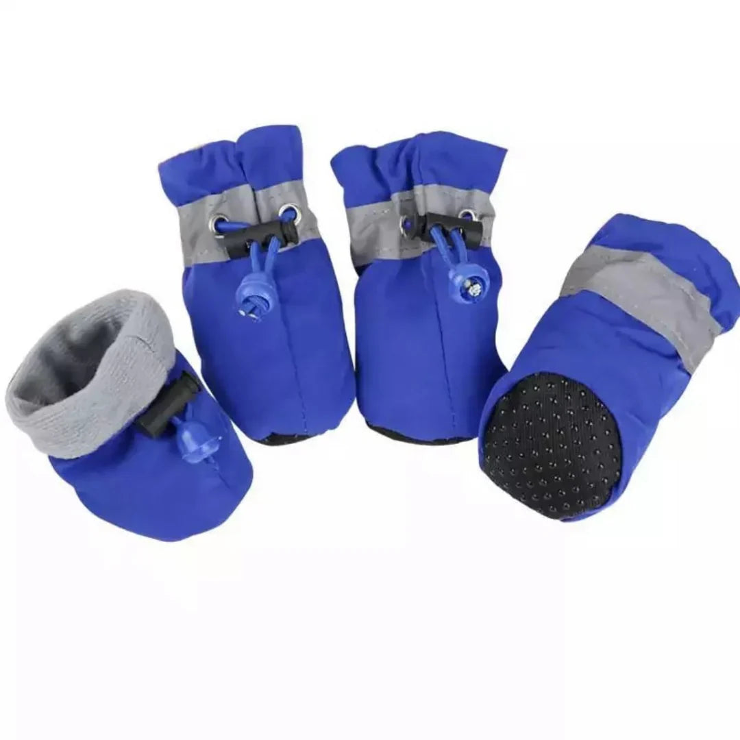 "Red winter dog boots with a non-slip sole, warm lining, and waterproof finish, perfect for cold, wet conditions."