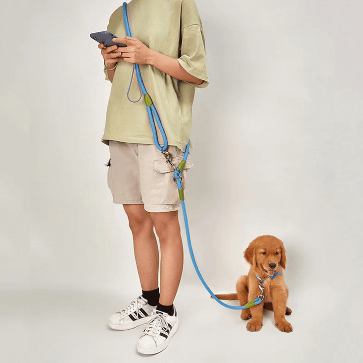 Reflective hands-free dog leash with bungee rope for running, ideal for large dogs; shown wrapped around waist.