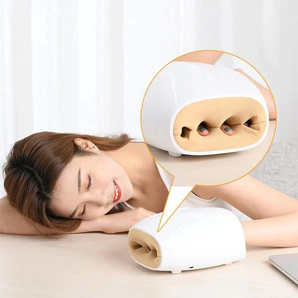 "Rejuvenating cordless electric hand massager with heat, ergonomic design, compact, white color, ideal for hand pain relief."