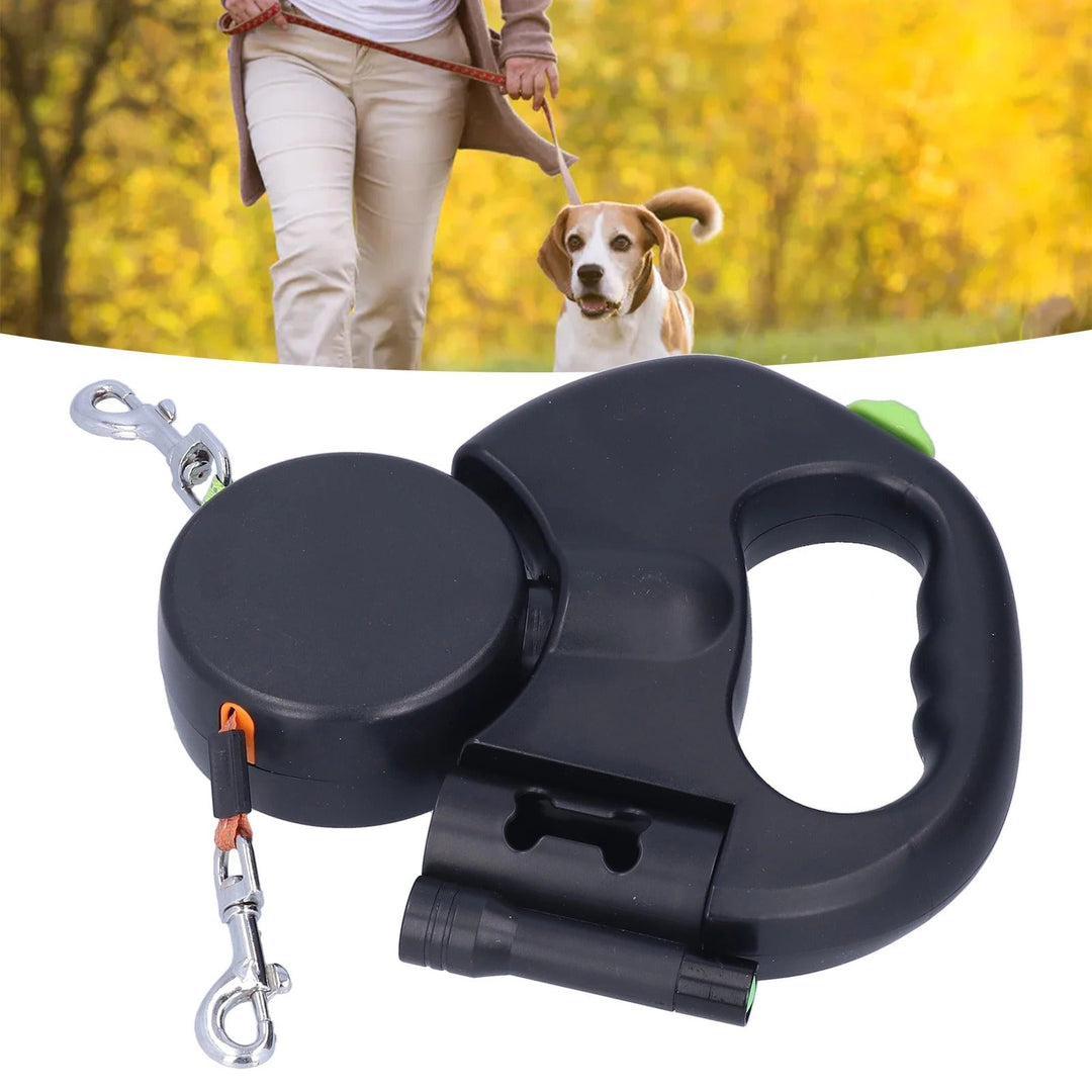 "Retractable double dog leash with flashlight, bag dispenser; durable nylon straps, ergonomic grip for tangle-free walking."