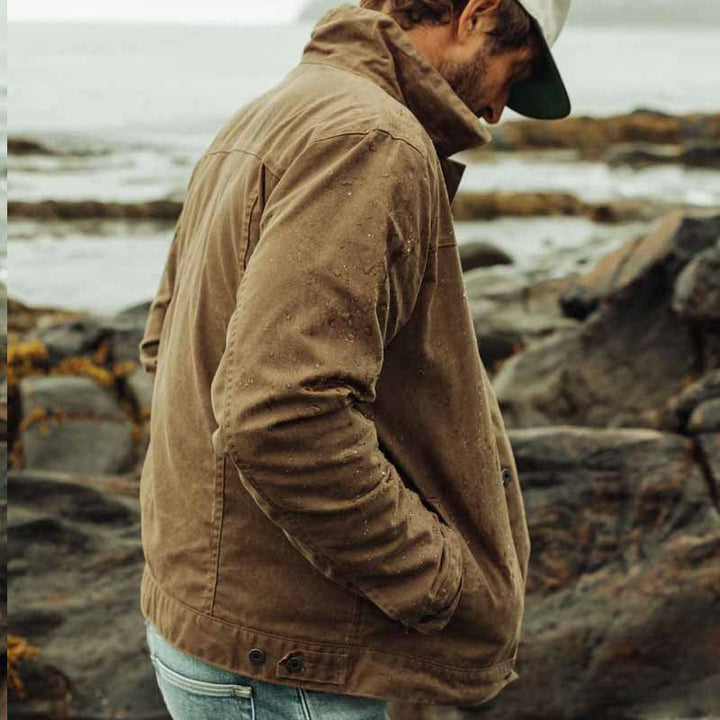 "Rugged deep brown men's utility jacket, front view, with practical pockets, ideal for autumn urban and countryside use."