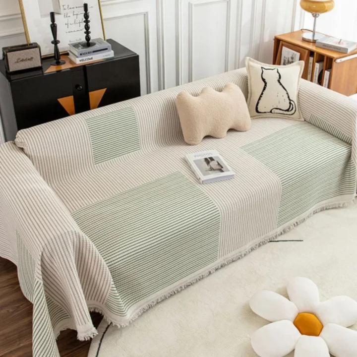 Scandinavian throw blanket with tassel edge, soft texture, cozy Nordic style, perfect for sofa decor and protection.
