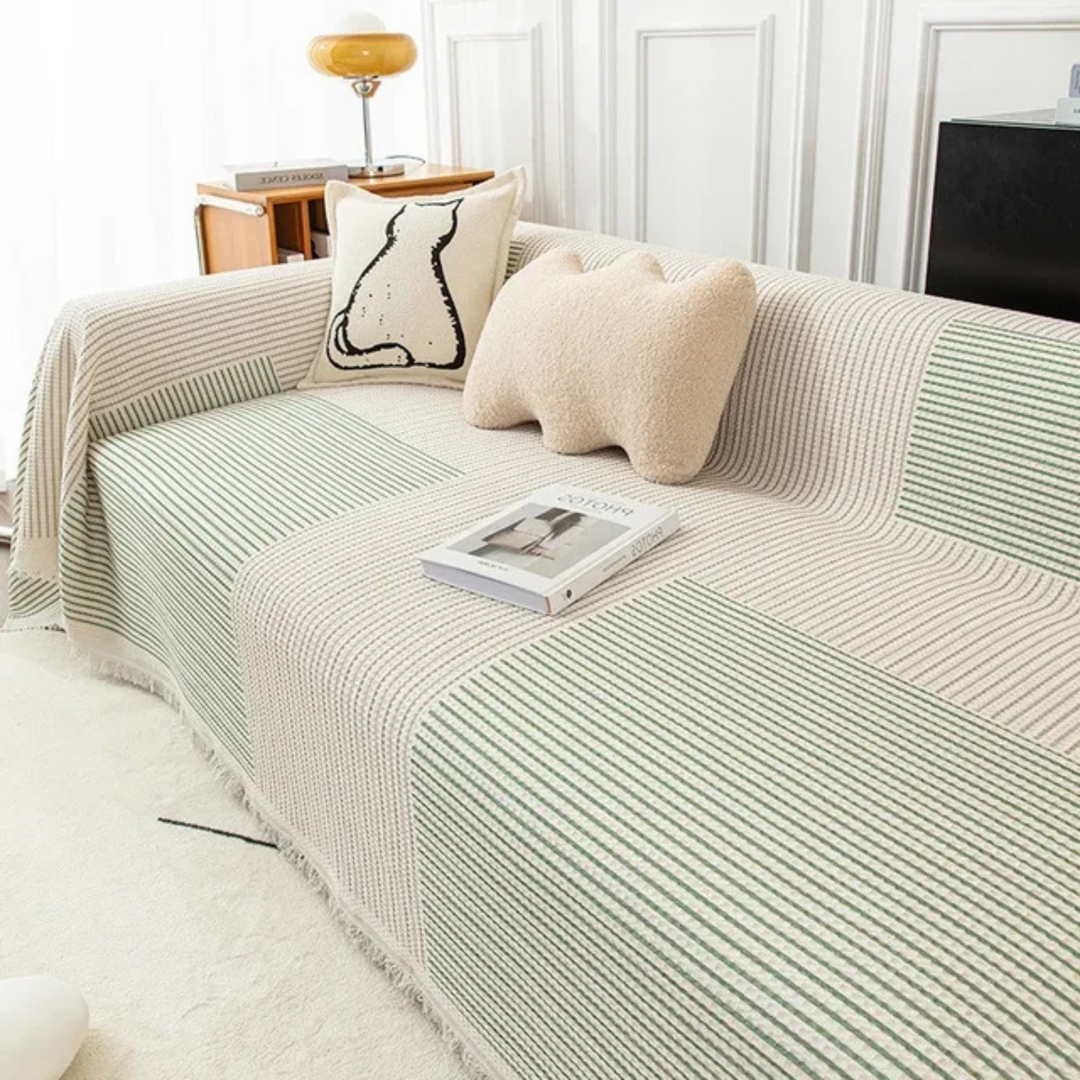 Scandinavian throw blanket with tassel edge, soft texture, cozy Nordic style, perfect for sofa decor and protection.