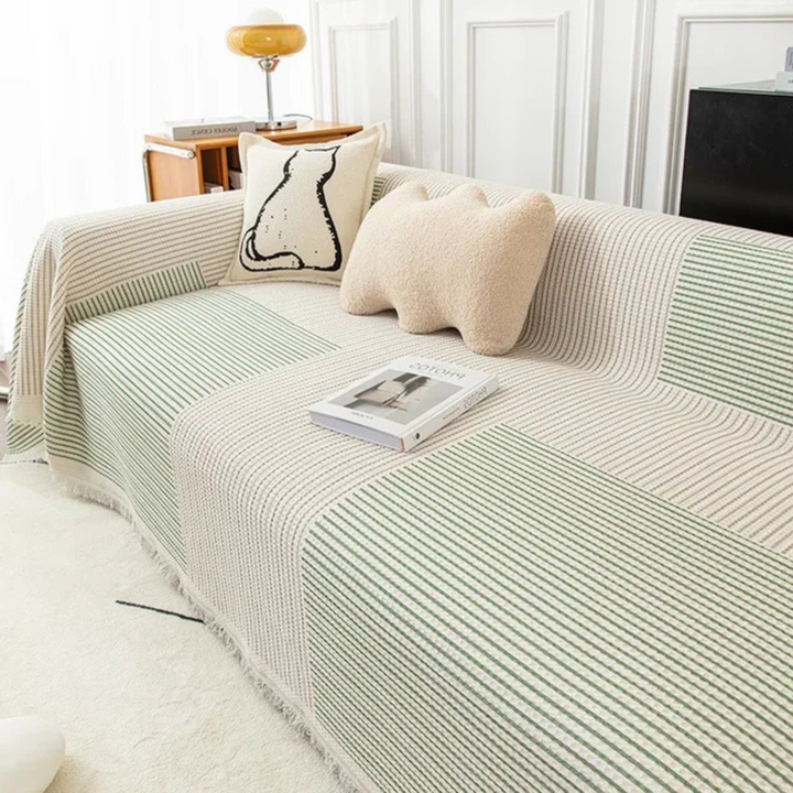 Scandinavian throw blanket with tassel edge, soft texture, cozy Nordic style, perfect for sofa decor and protection.
