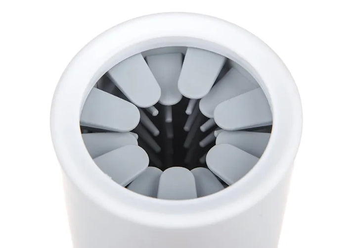 "Silicone paw cleaner for pets with soft bristles; portable, eco-friendly; ideal for dogs and cats' sensitive paws."