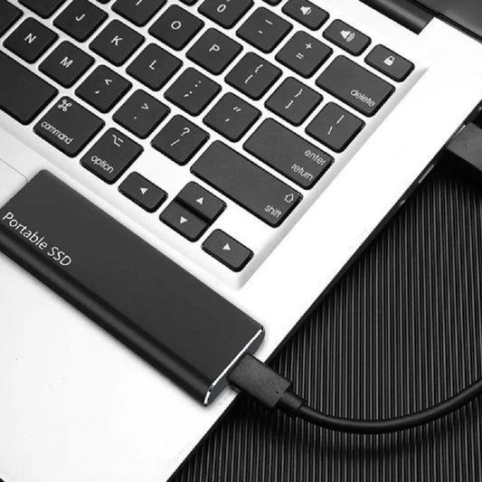 "Sleek 4TB USB-C external drive with slim metal casing, ideal for portable storage, compatible with PC and Mac."