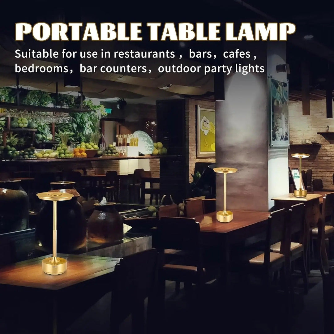 "Sleek cordless LED table lamp with a touch sensor, featuring a minimalist design in available colors: black, gold, silver."