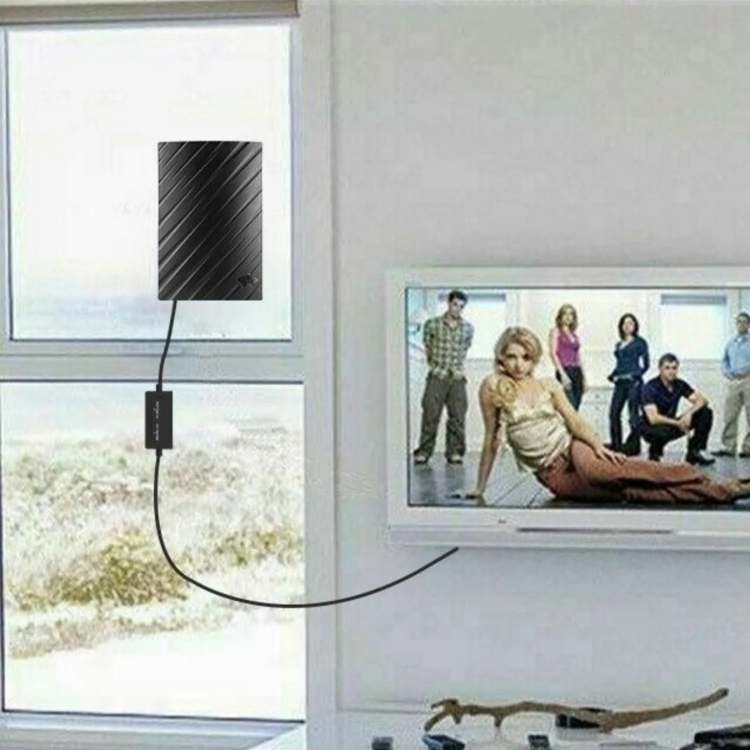 Sleek FreeStream 4K Indoor TV Aerial captures free HD channels with ease, compact design ideal for elegant home setups.