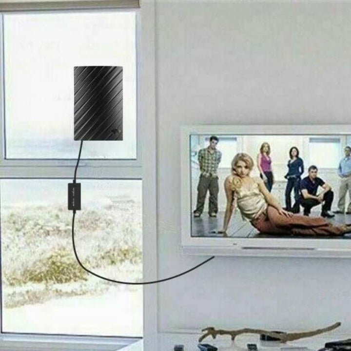 Sleek FreeStream 4K Indoor TV Aerial captures free HD channels with ease, compact design ideal for elegant home setups.