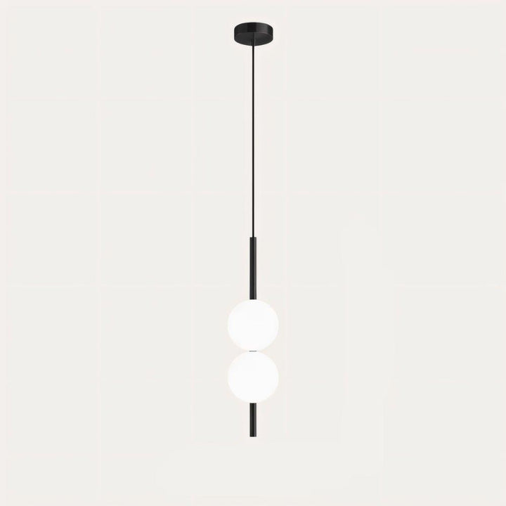 "Sleek glass ball Nordic pendant light with metal frame, LED bulb; available in black or brass, perfect for modern decor."