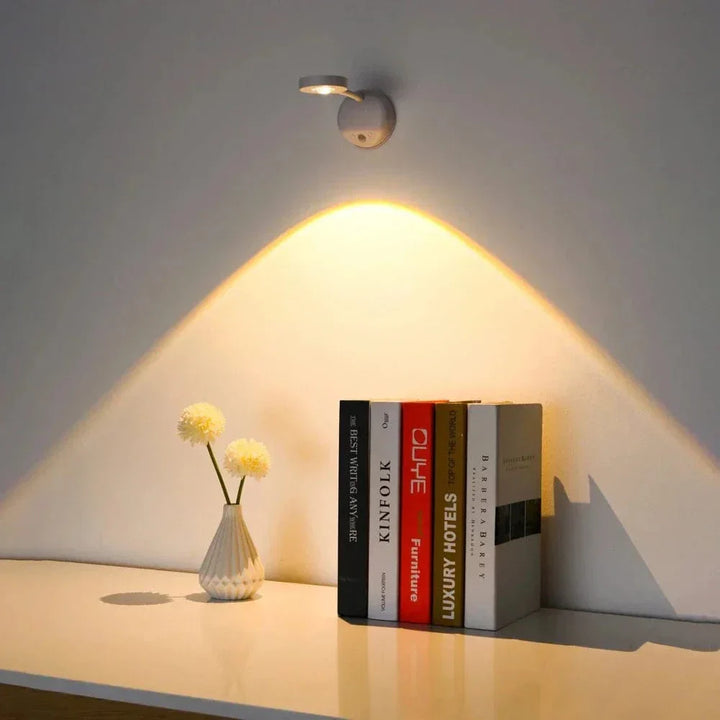 "Sleek LED motion light with 360° rotation, advanced sensor, and customizable colors for versatile lighting in any space."
