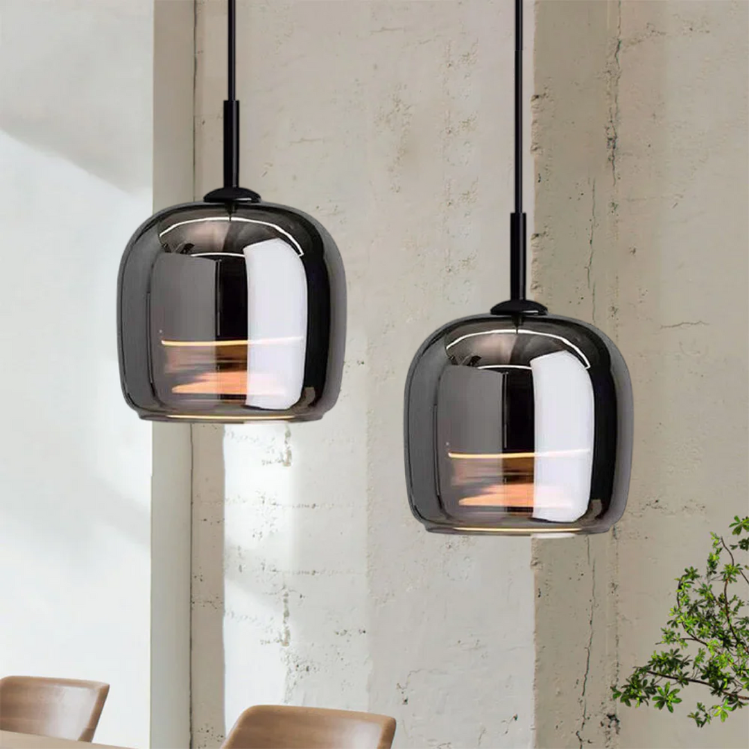 "Sleek Nordic black glass LED pendant light for modern interiors, perfect for kitchen or bedroom, adds elegance and warm glow