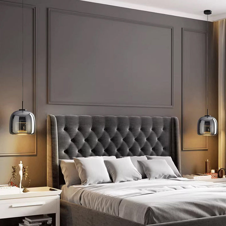"Sleek Nordic black glass LED pendant light for modern interiors, perfect for kitchen or bedroom, adds elegance and warm glow
