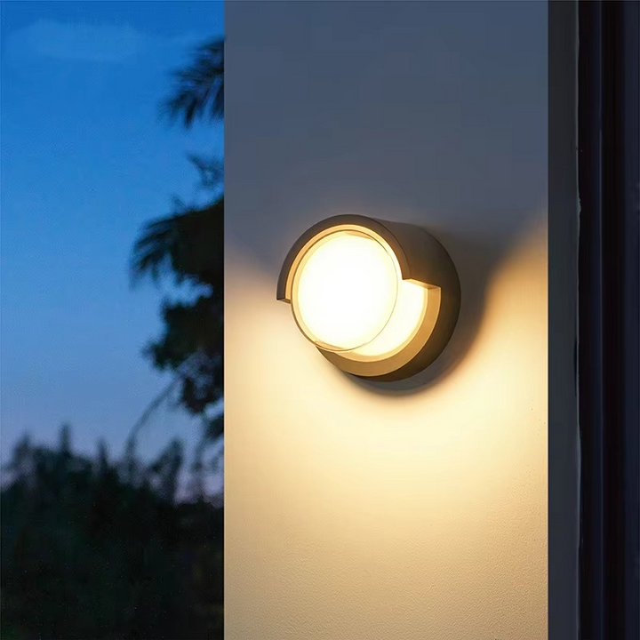 Sleek outdoor wall lamp with motion sensor and LED light, featuring IP65 waterproof rating and minimalist geometric design.