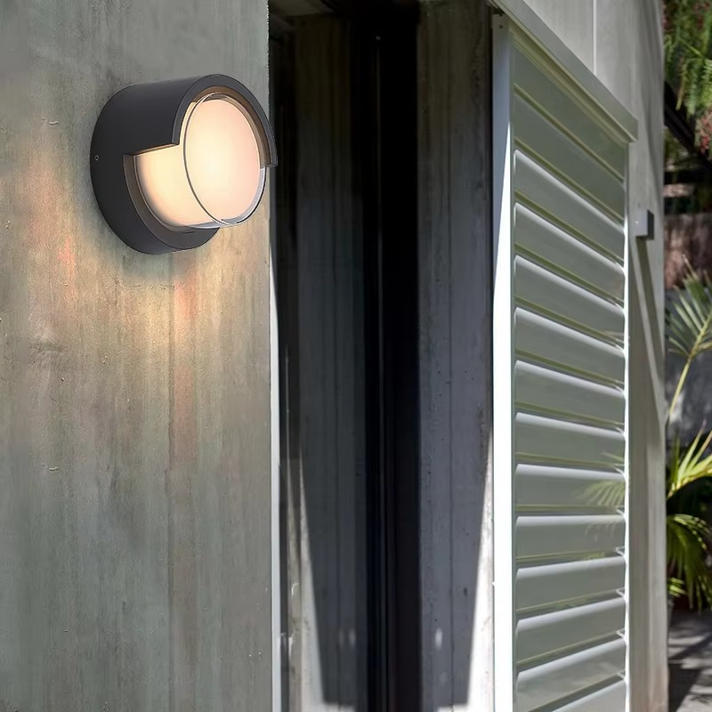 Sleek outdoor wall lamp with motion sensor and LED light, featuring IP65 waterproof rating and minimalist geometric design.