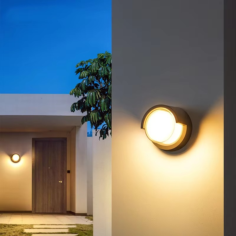 Sleek outdoor wall lamp with motion sensor and LED light, featuring IP65 waterproof rating and minimalist geometric design.