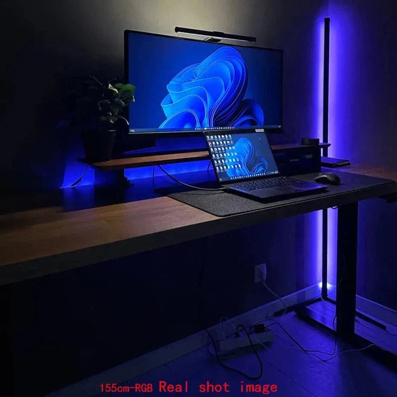 "Sleek RGB corner lamp with remote, minimalist design, vibrant colors, chrome finish, ideal for modern interiors."