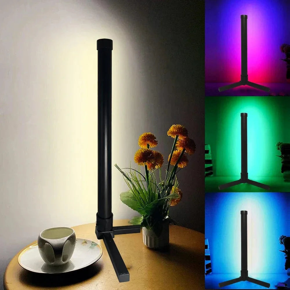 "Sleek RGB corner lamp with remote, minimalist design, vibrant colors, chrome finish, ideal for modern interiors."