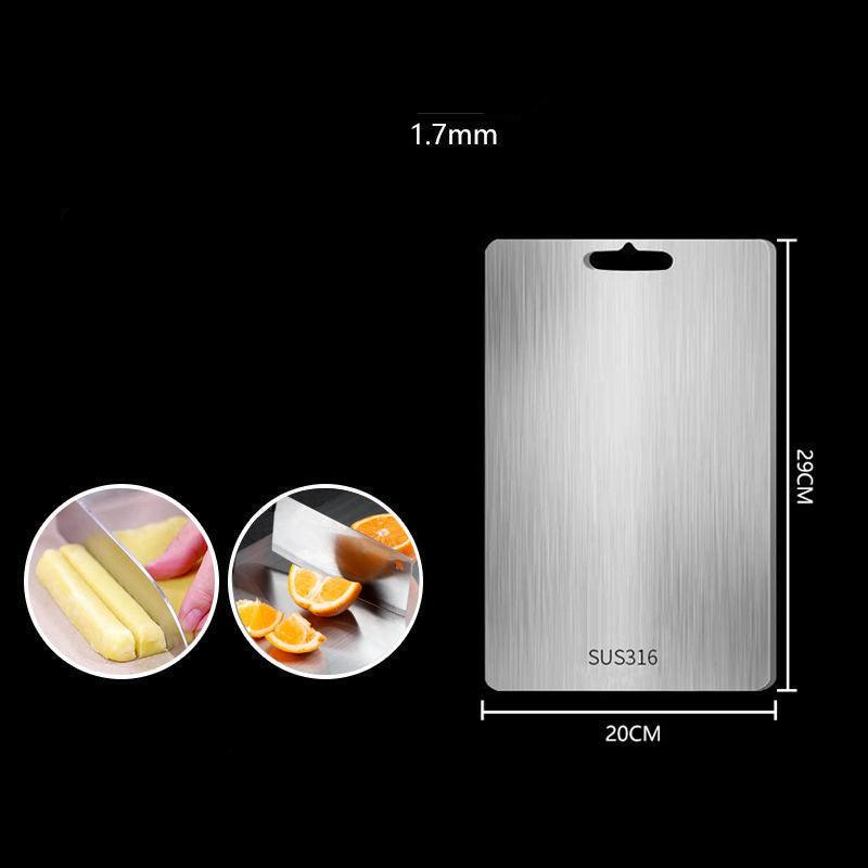 "Sleek stainless steel cutting board in use, showing durability and knife-friendly surface for kitchen prep tasks."