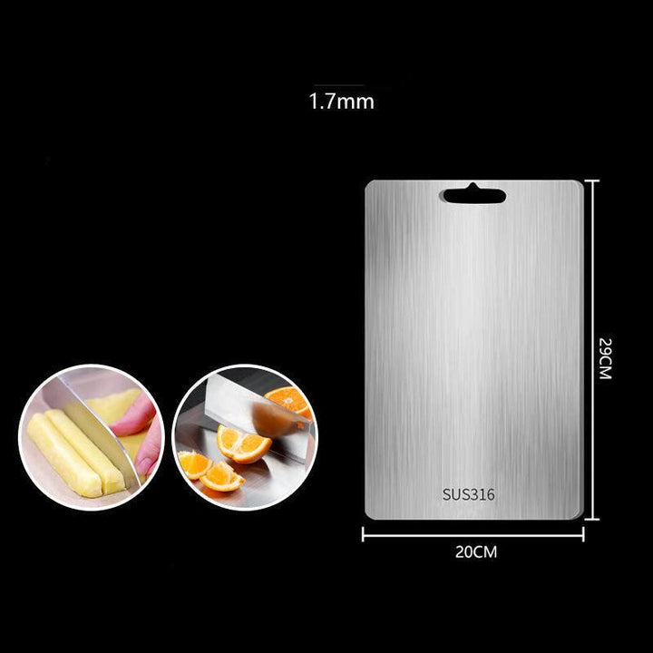 "Sleek stainless steel cutting board in use, showing durability and knife-friendly surface for kitchen prep tasks."