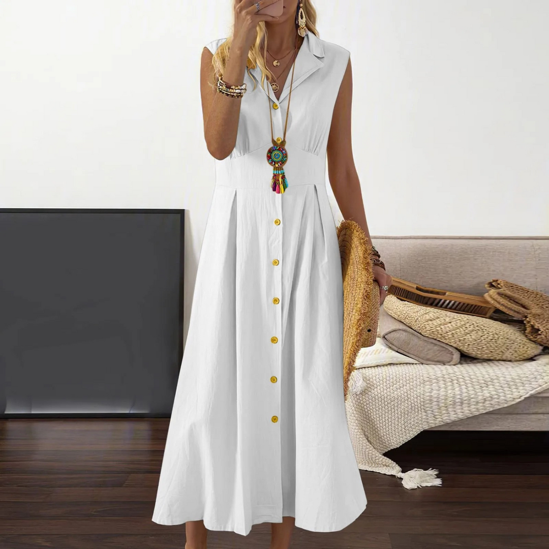 Sleeveless A-Line V-neck midi dress with collared neckline and button-down front, ideal for versatile, elegant styling.