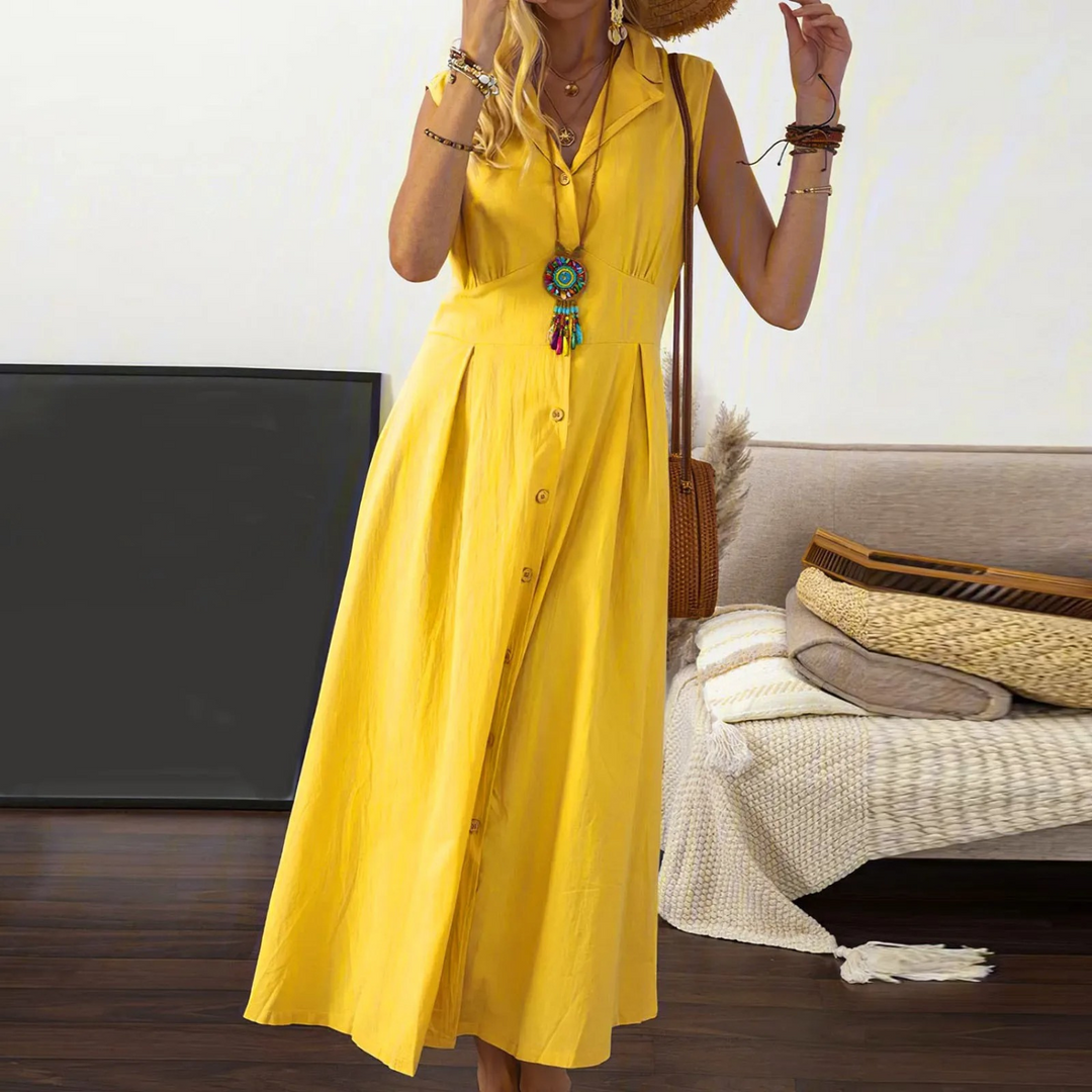 Sleeveless A-Line V-neck midi dress with collared neckline and button-down front, ideal for versatile, elegant styling.