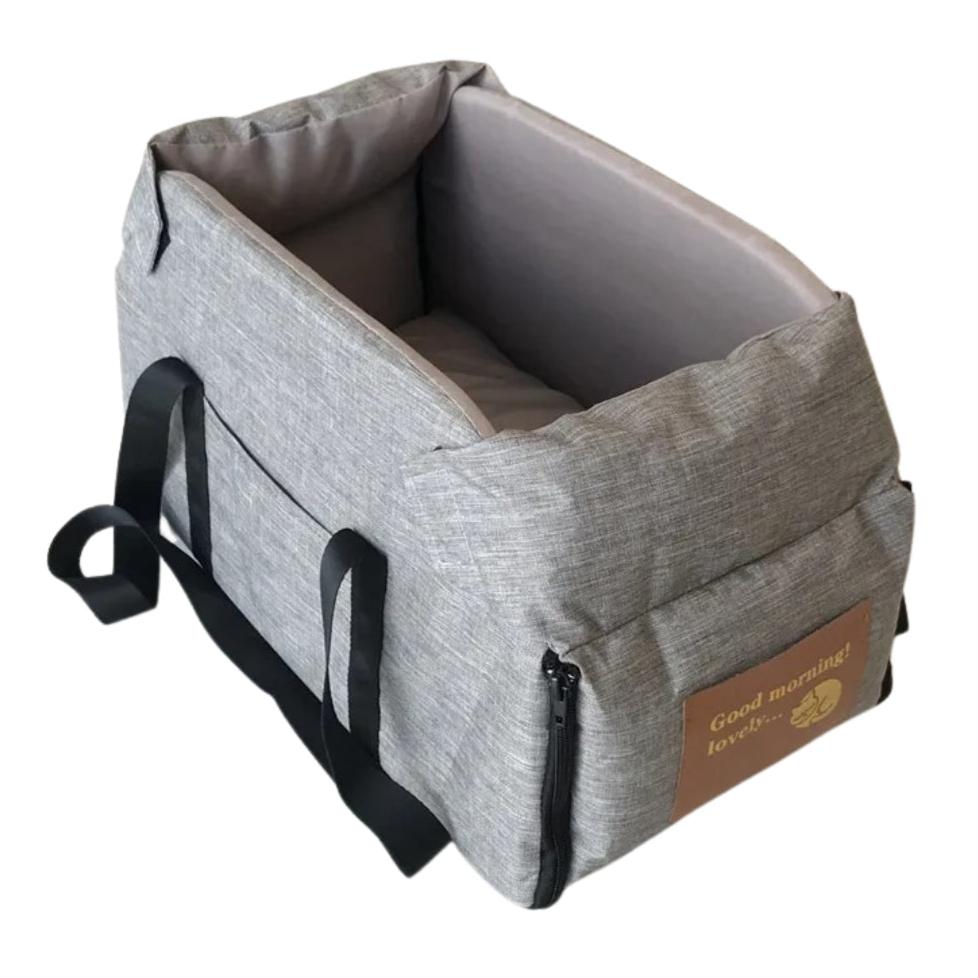 "Small Dog Cosy Car Seat Carrier Basket with padded interior, sleek design, fits securely in car for safe pet travel."