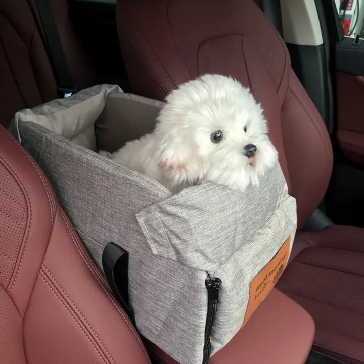 "Small Dog Cosy Car Seat Carrier Basket with padded interior, sleek design, fits securely in car for safe pet travel."
