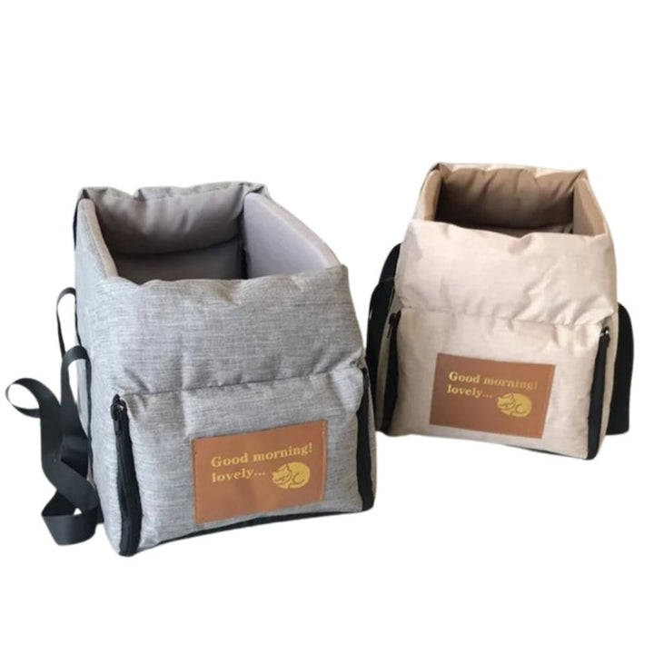 "Small Dog Cosy Car Seat Carrier Basket with padded interior, sleek design, fits securely in car for safe pet travel."
