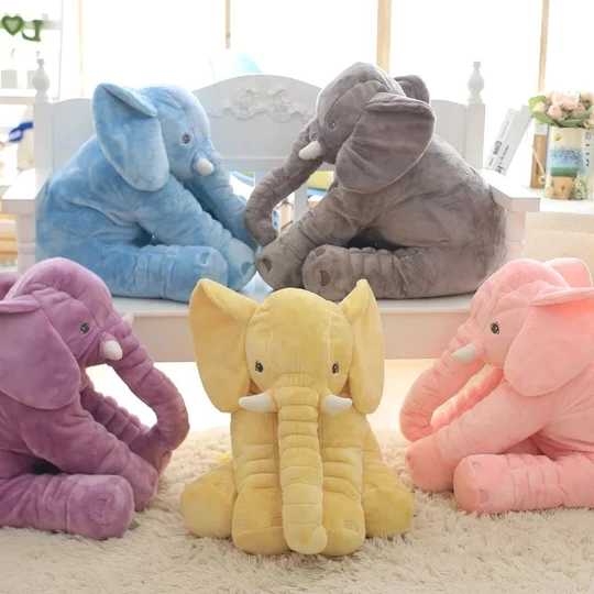 "Soft baby elephant plush pillow, perfect for snuggling and play, in pastel colors for newborn comfort and nursery decor."
