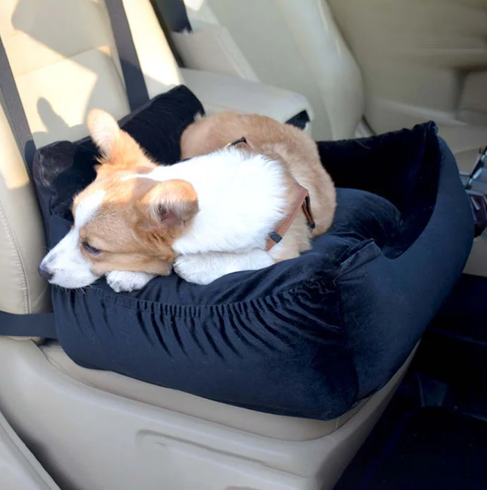 "Soft, padded pet car seat cover for dogs and cats. Features adjustable straps, fits most vehicles for safe, comfy travel."