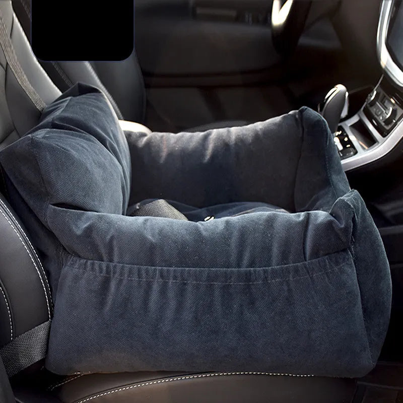 "Soft, padded pet car seat cover for dogs and cats. Features adjustable straps, fits most vehicles for safe, comfy travel."