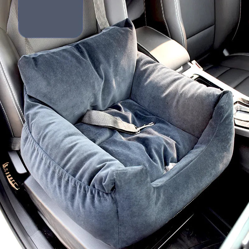 "Soft, padded pet car seat cover for dogs and cats. Features adjustable straps, fits most vehicles for safe, comfy travel."