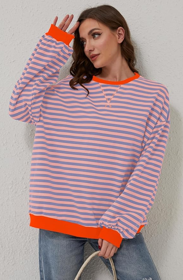 "Soft women's striped crewneck sweater, high-quality material, timeless design, versatile fashion for casual wear."
