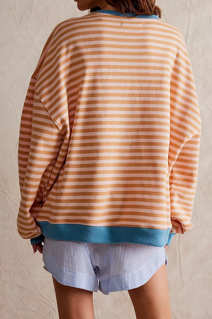 "Soft women's striped crewneck sweater, high-quality material, timeless design, versatile fashion for casual wear."