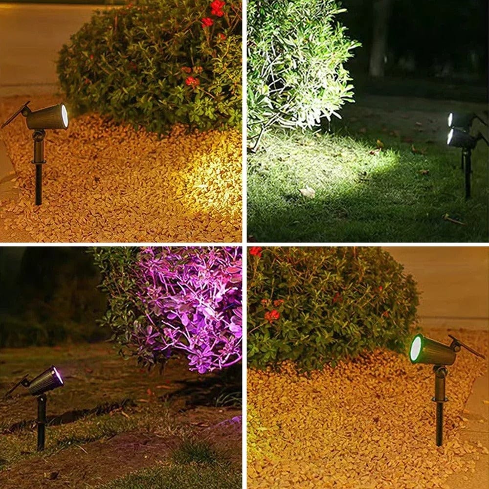 "Solar-powered LED garden spotlight with 9 color options, illuminating a pathway; eco-friendly outdoor lighting solution."