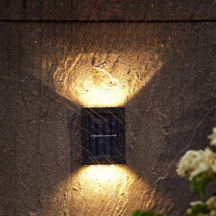 Solar-powered LED wall lights with sleek, black design, perfect for eco-friendly outdoor garden illumination and easy install