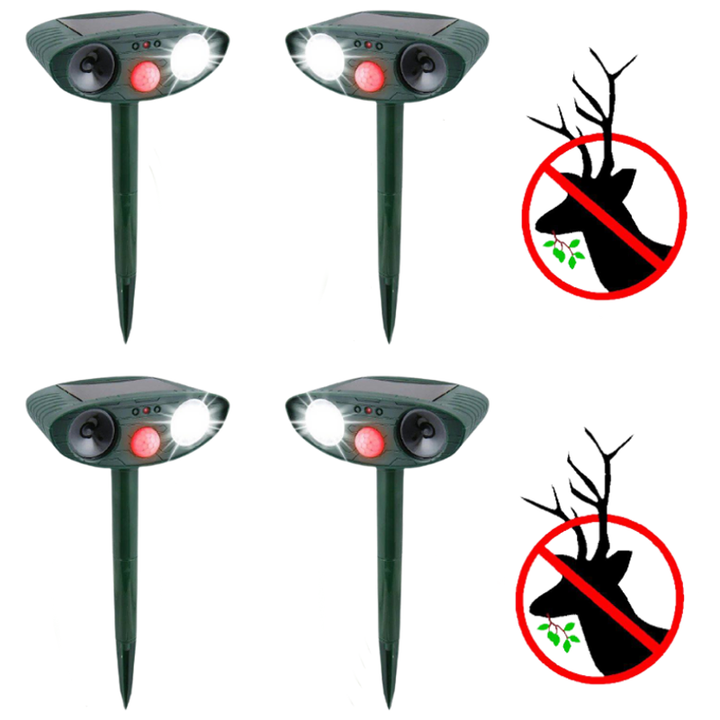 Solar-powered ultrasonic deer repeller with green casing, motion sensor, solar panel, ideal for outdoor garden protection.