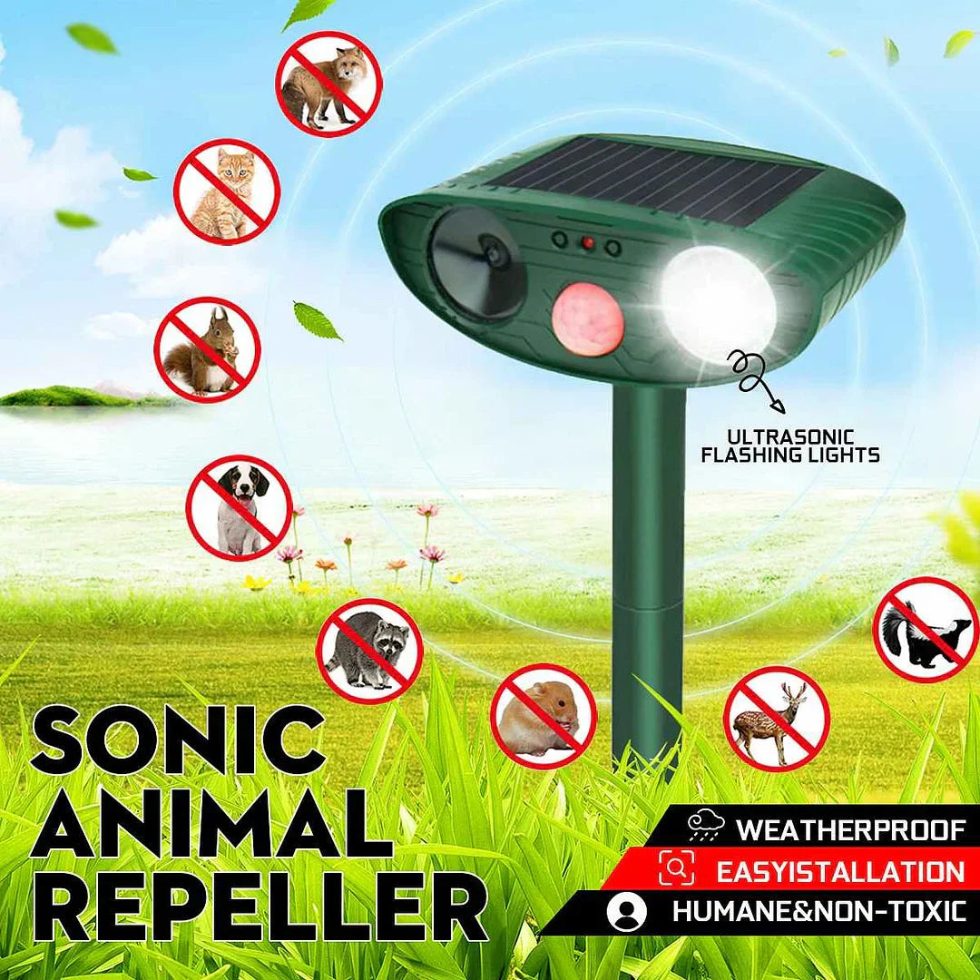 Solar-powered ultrasonic deer repeller with green casing, motion sensor, solar panel, ideal for outdoor garden protection.